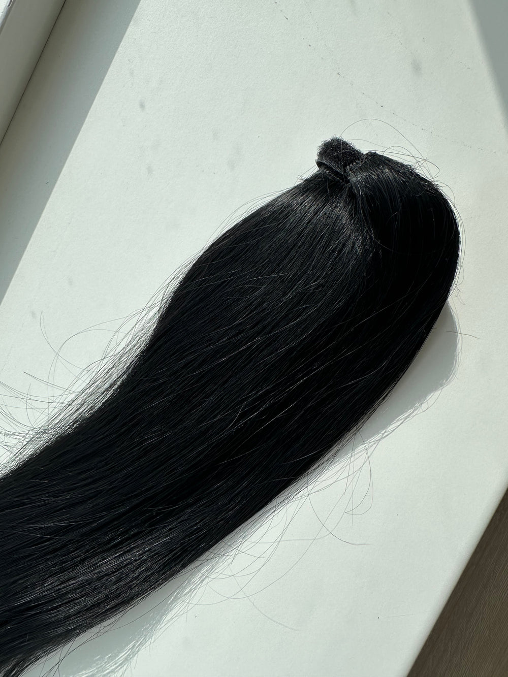 Ponytail extension 50 cm sortbrun #1 Espresso 100 gram ægte hår